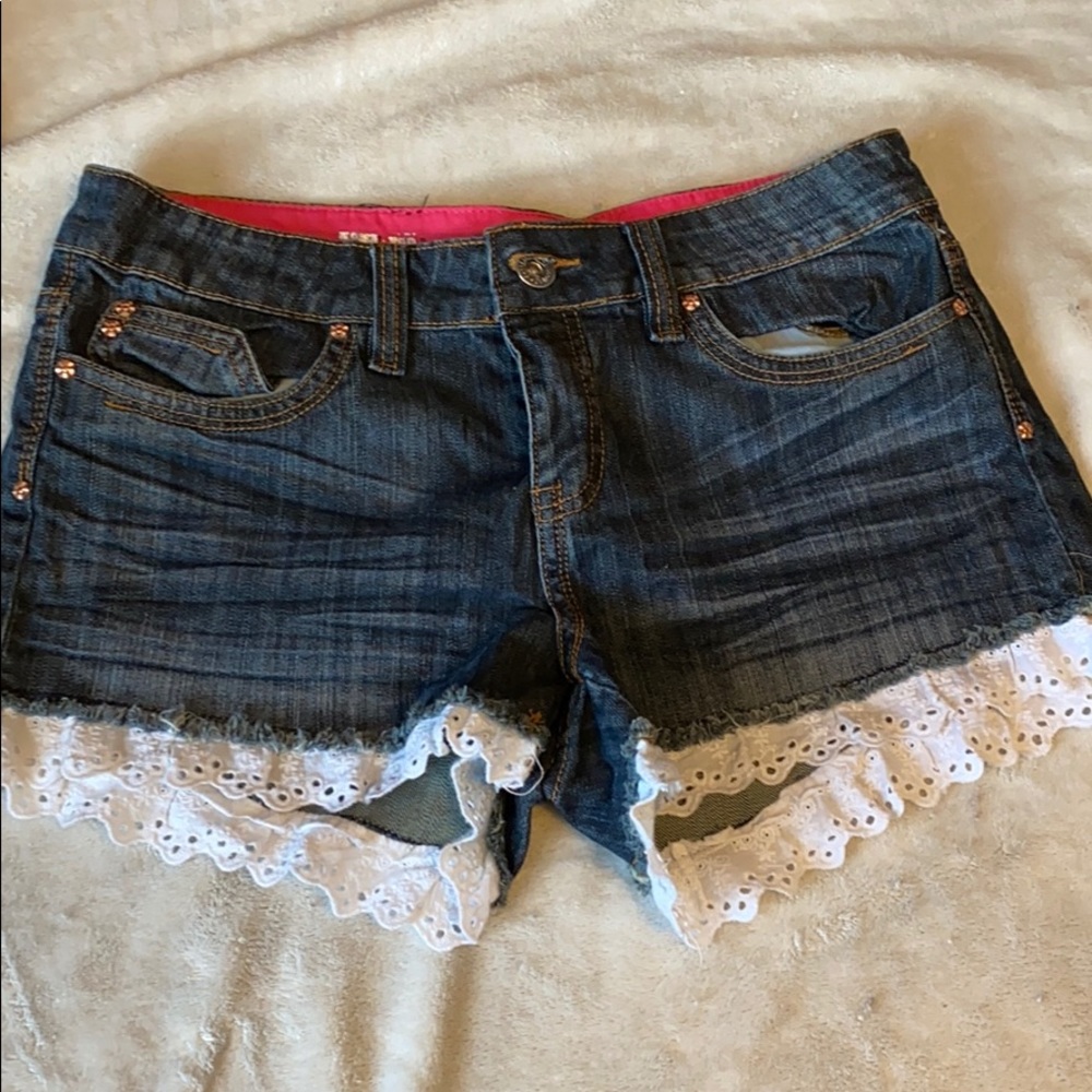 Dollhouse lace-lined jean shorts.